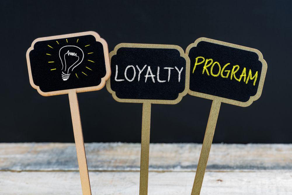 Signs spelling out loyalty program